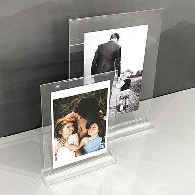 Clear Acrylic Photo Frames with Clear Base, showcasing some family photos inside