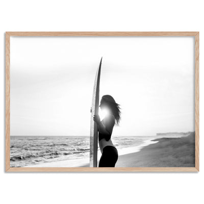 Sunrise Surfer B&W - Art Print, Poster, Stretched Canvas, or Framed Wall Art Print, shown in a natural timber frame