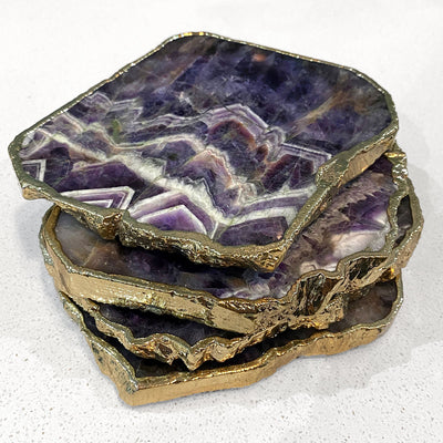 Agate Gold Edged Coasters in Amythest. Set of 4 stacked on top of each other.