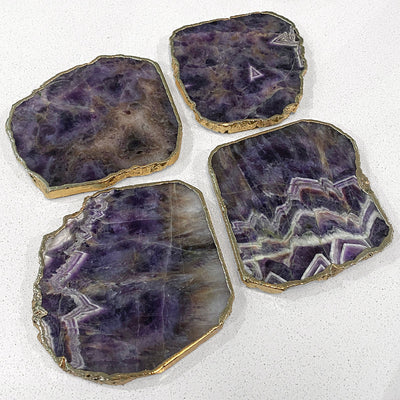 Agate Gold Edged Coasters in Amythest. Set of 4. Flat lay view.