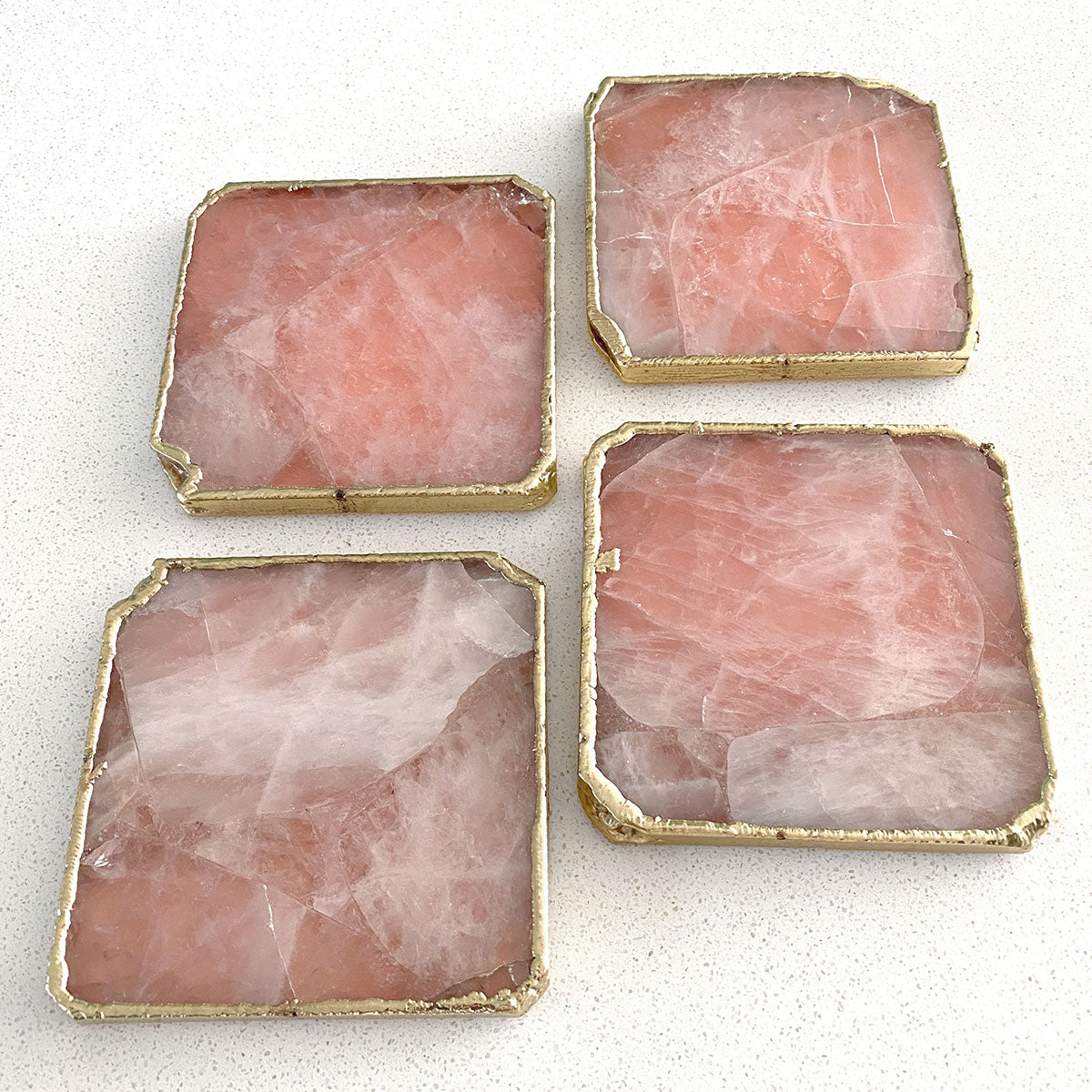 Agate Gold Edged Coasters in Rose Quartz. Set of 4. Close up view