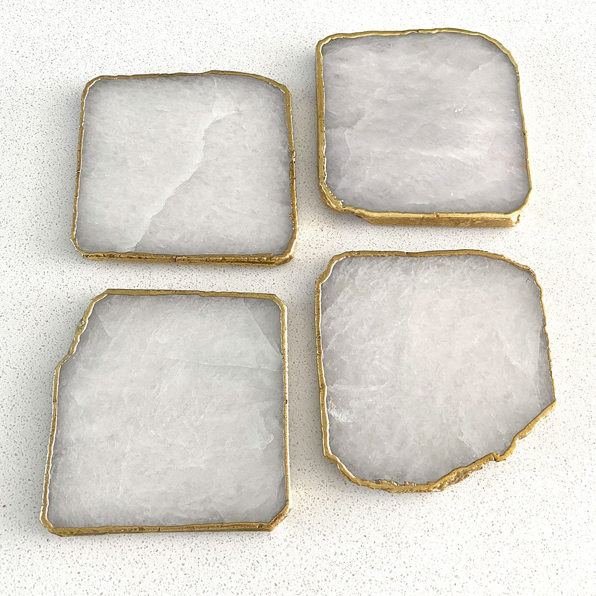 Agate Gold Edged Coasters in White Agate. Set of 4. Close up view