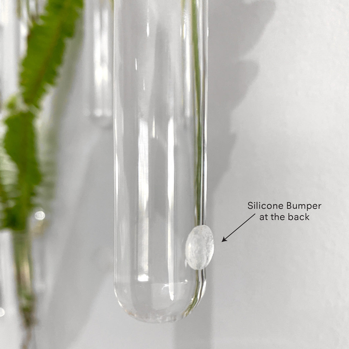 Clear Test Tube Plant Holder showing a close up photo of the silicone bumper on the backside of the tube