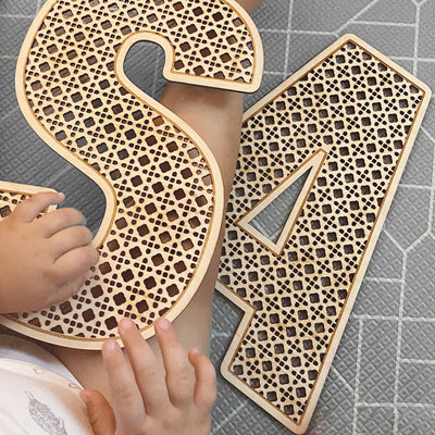 Baby holding rattan custom letters in Large size
