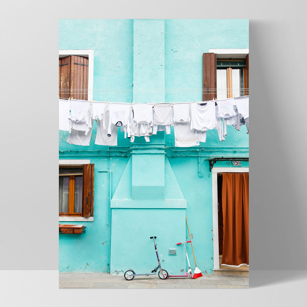 Turquoise Terrace Washing Burano - Art Print by Victoria's Stories, Poster, Stretched Canvas, or Framed Wall Art Print, shown as a stretched canvas or poster without a frame