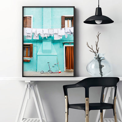 Turquoise Terrace Washing Burano - Art Print by Victoria's Stories, Poster, Stretched Canvas or Framed Wall Art Prints, shown framed in a room
