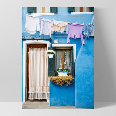 Bright Blue Terrace Washing Burano - Art Print by Victoria's Stories, Poster, Stretched Canvas, or Framed Wall Art Print, shown as a stretched canvas or poster without a frame