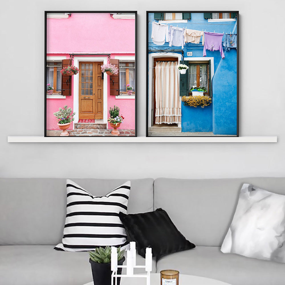 Bright Blue Terrace Washing Burano - Art Print by Victoria's Stories, Poster, Stretched Canvas or Framed Wall Art, shown framed in a home interior space
