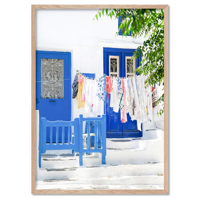 Blue Terrace Washing Santorini - Art Print by Victoria's Stories, Poster, Stretched Canvas, or Framed Wall Art Print, shown in a natural timber frame