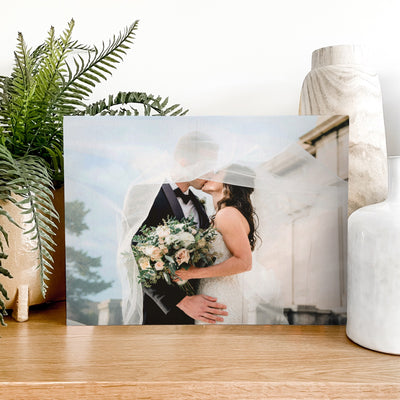 Premium Wood Photo Block on a table in a home next to some home decor items