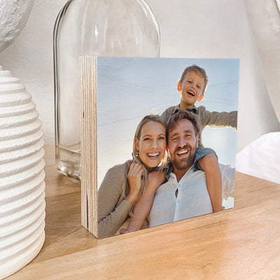 Premium Wood Photo Block on bedside table showing on a side angle 